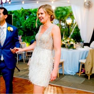 Perfect bridal reception dress: ivory sequin mini-dress with ostrich feathers